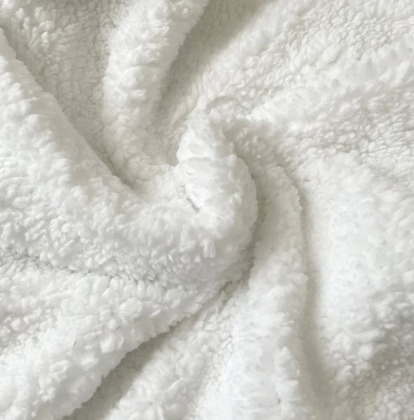 BlattLux™ – Kuschelige Fleece-Decke in Blattform